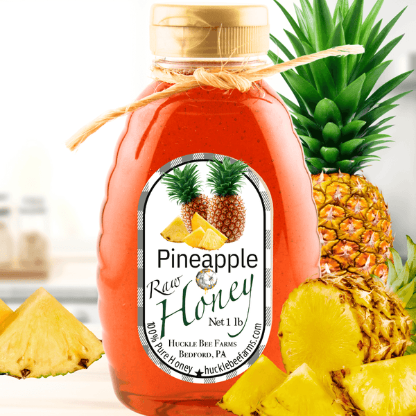 Pineapple Raw Honey from the Tropical Honey Bundle, 1 lb bottle with fresh pineapple visuals, perfect for sweet tropical dishes and drinks.