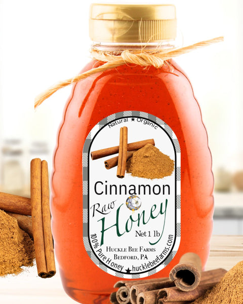 Cinnamon Honey: Nature’s Perfect Pairing with 100% Pure Honey in a 1 lb bottle from Huckle Bee Farms, featuring raw honey and ground cinnamon sticks.