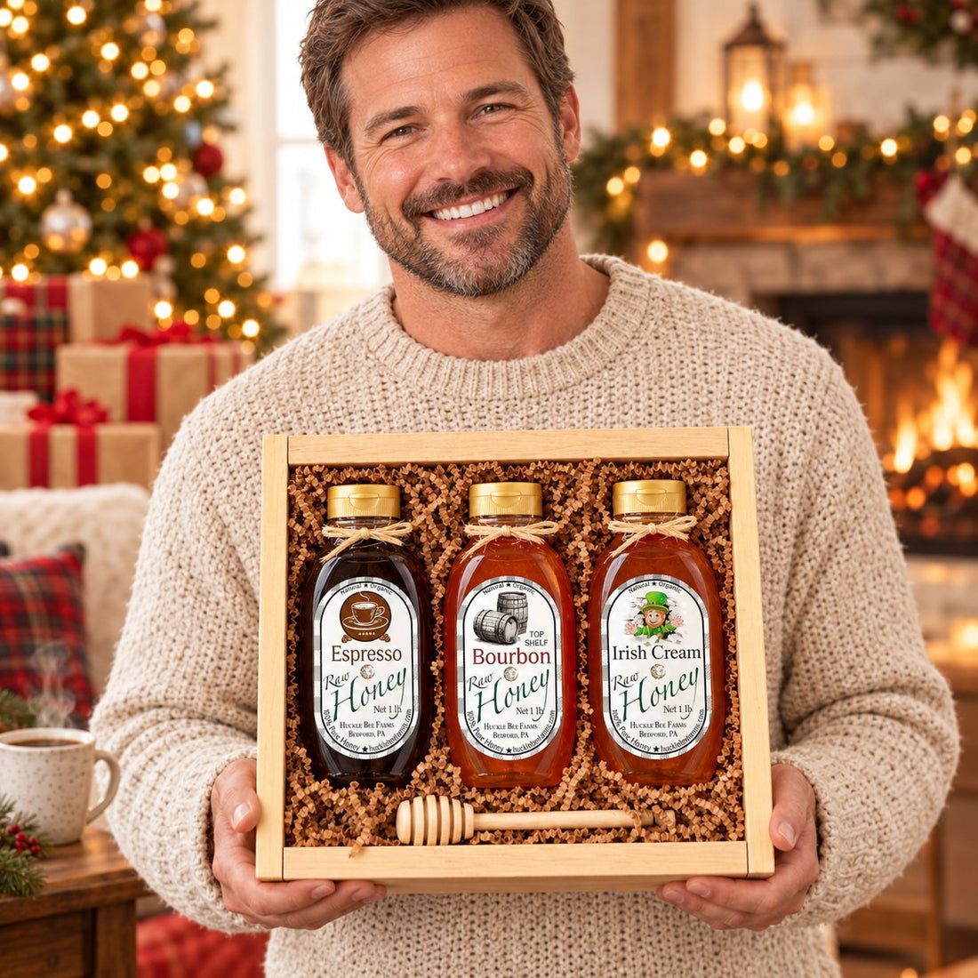 Smiling man holding a Huckle Bee Farms wooden gift box with Espresso, Bourbon and Irish Cream honey