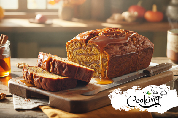 Pumpkin Honey Banana Bread slice on a plate beside a steaming cup of coffee, topped with Huckle Bee Farms Pumpkin Honey for a cozy fall breakfast.