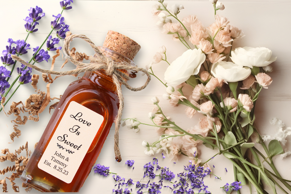 Elegant mini honey jar wedding favor with rustic twine and personalized label, placed on a linen tablecloth with soft natural lighting—perfect for a sweet, memorable gift