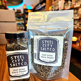 Buy Chef's Grind Black Pepper Online in glass jar and resealable pouch by Steel City Salt Company. Bold Tellicherry pepper blend for everyday cooking.