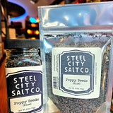 Buy Blue Poppy Seeds Online for Baking & Cooking in 2.25oz glass jar and 2.3oz resealable pouch by Steel City Salt Company. Ideal for breads and muffins.