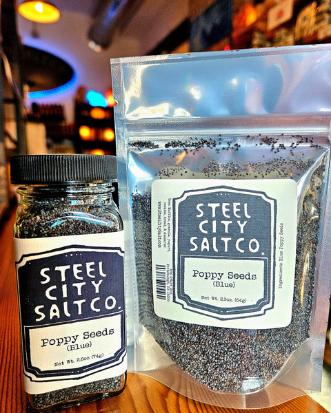Buy Blue Poppy Seeds Online for Baking & Cooking in 2.25oz glass jar and 2.3oz resealable pouch by Steel City Salt Company. Ideal for breads and muffins.