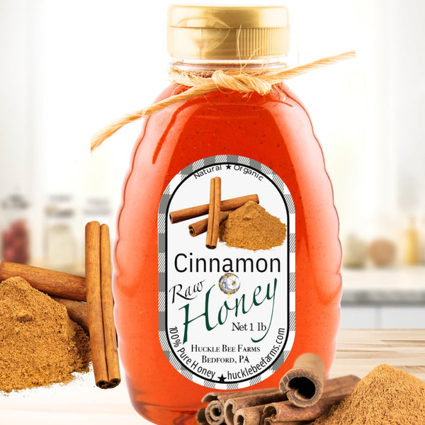 Smooth cinnamon honey with a warm, spiced glow, capturing the comforting essence of cinnamon sticks blended with golden honey.
