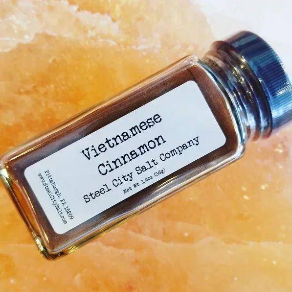 Vietnamese Cinnamon by Steel City Salt Company in a clear spice jar, showcasing its rich color and high oil content for bold flavor.