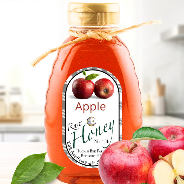 Rich amber apple honey with a crisp, fruity aroma, reflecting the taste of freshly picked autumn apples in liquid form.