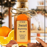 Christmas Magic honey blend in a decorative glass jar with a cork lid and twine bow. Infused with cinnamon, orange, and hazelnut flavors, perfect for festive gifting.