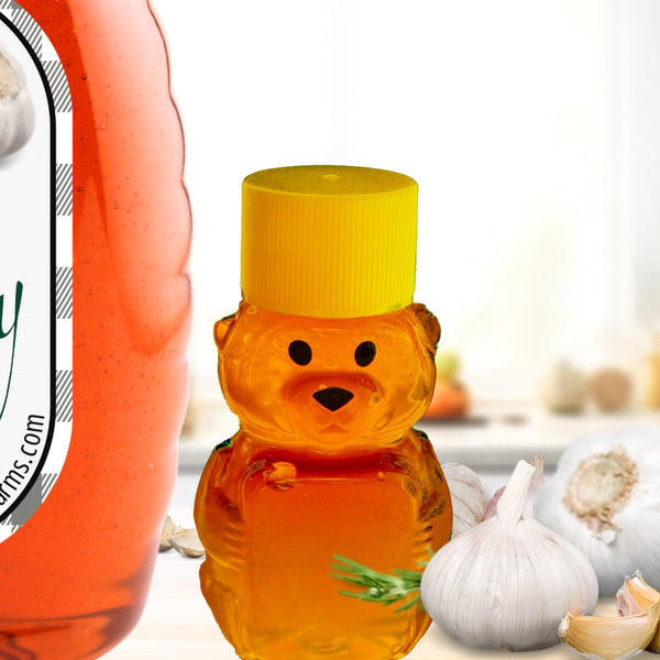 Garlic honey in a traditional bottle alongside a bear-shaped honey container, showcasing a variety of honey packaging options.