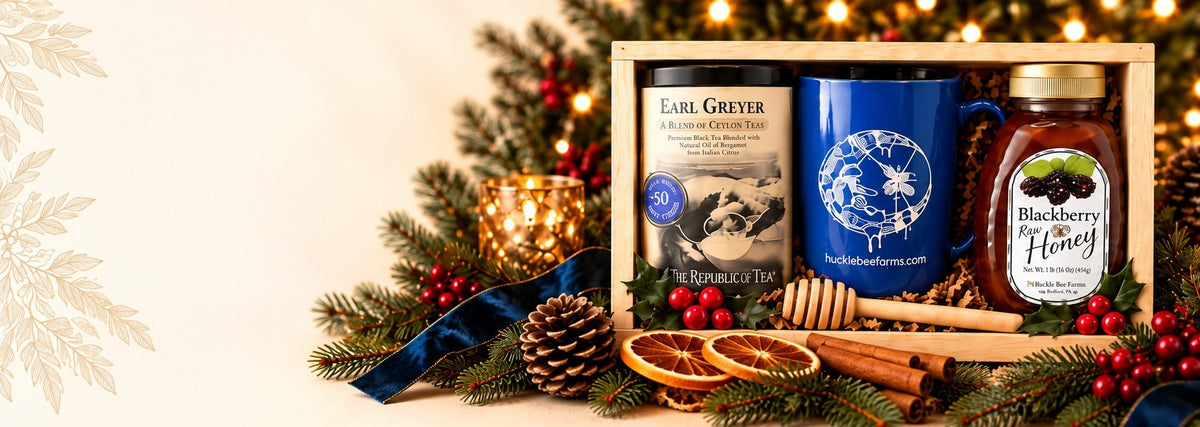 Huckle Bee Farms holiday gift crate with Earl Greyer tea, blue honey mug and Blackberry Raw Honey