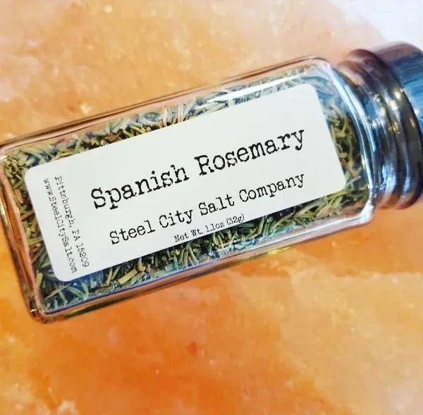 Whole Spanish Rosemary in clear spice jar by Steel City Salt Company. Aromatic herb from Spain ideal for enhancing savory dishes.