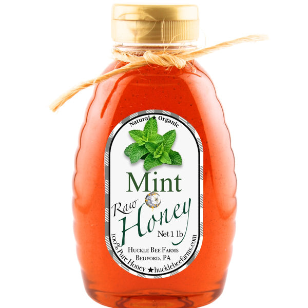 Pure Mint Infused Honey in a 1 lb jar with organic ingredients, offering a smooth texture and refreshing minty taste for culinary use.