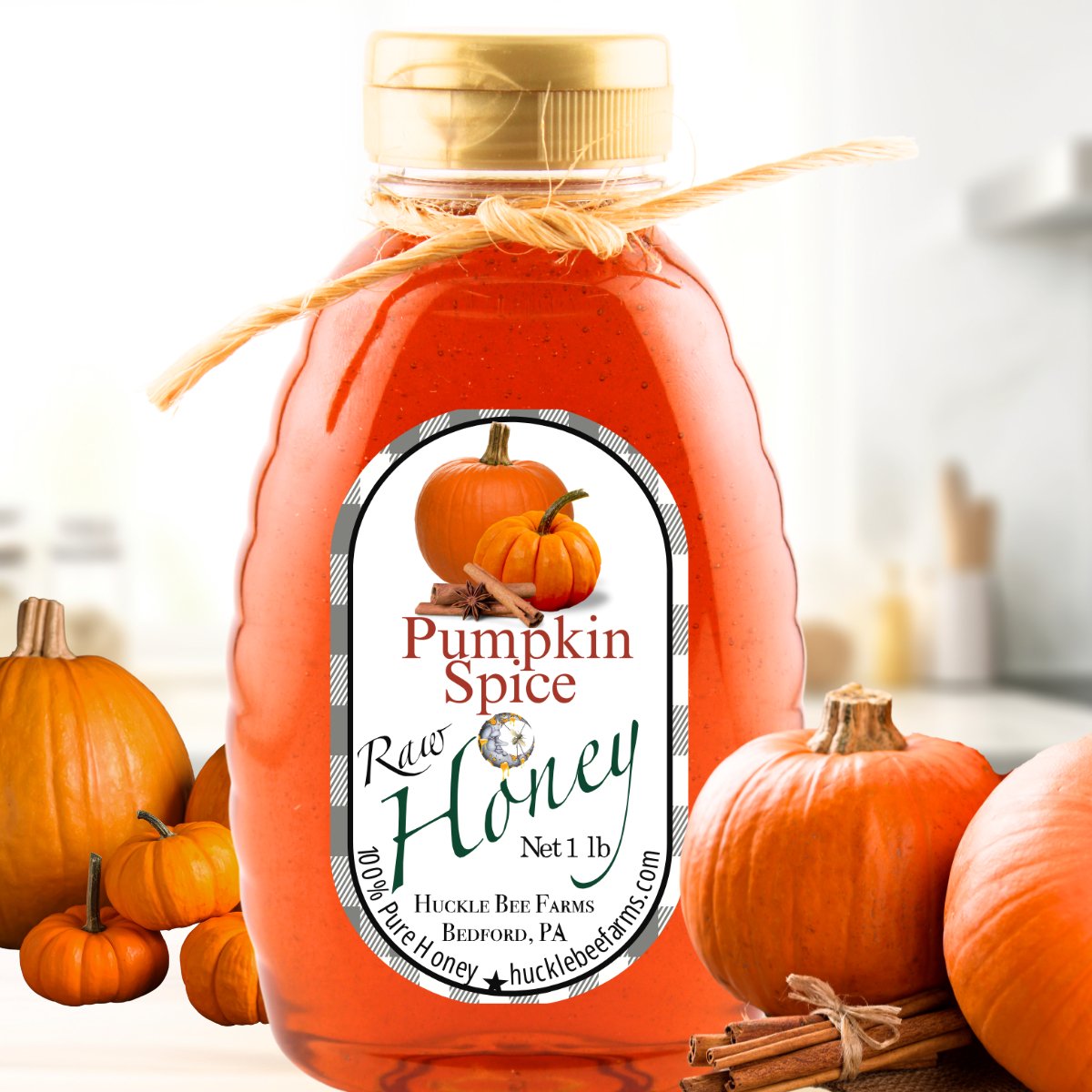 Pumpkin honey in a bottle with warm autumn tones, infused with cozy pumpkin spice flavor, perfect for fall drinks and baked goods.