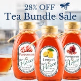 Huckle Bee Farms Tea Bundle featuring three infused honeys—peppermint, lemon, and pomegranate—arranged together as the perfect gift set for tea lovers.
